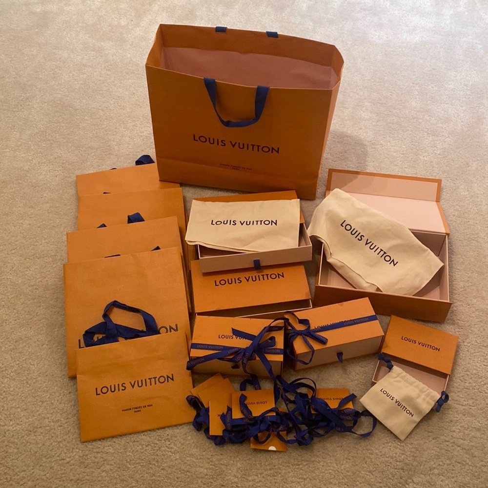 Louis Vuitton authentic empty bags and boxes. Sold all together